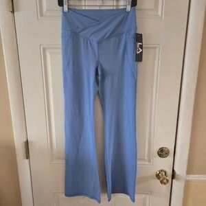 LA Gear Crossover Waist Flare Yoga Pants Leggings Blue Pockets Womens Small NWT